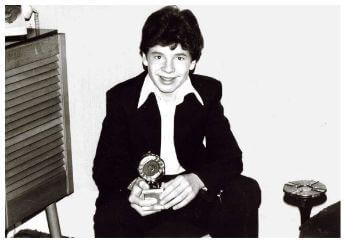 Dean Meredith: Our Story &ndash; Young Dean with coins